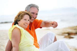 Couple sitting on the beach